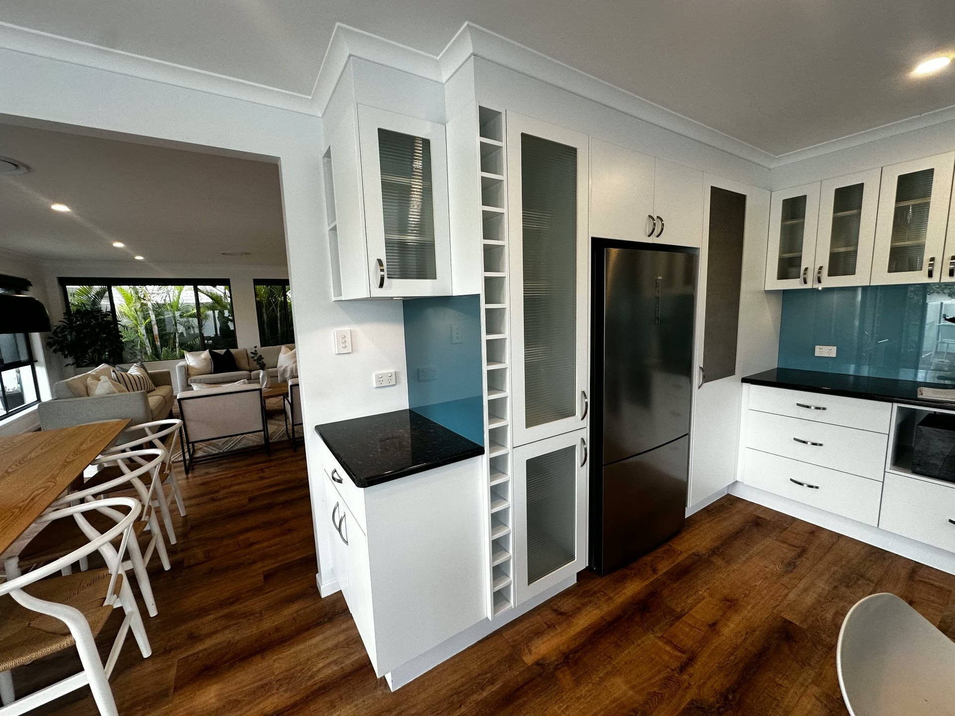 Existing kitchen connecting to dining and living areas