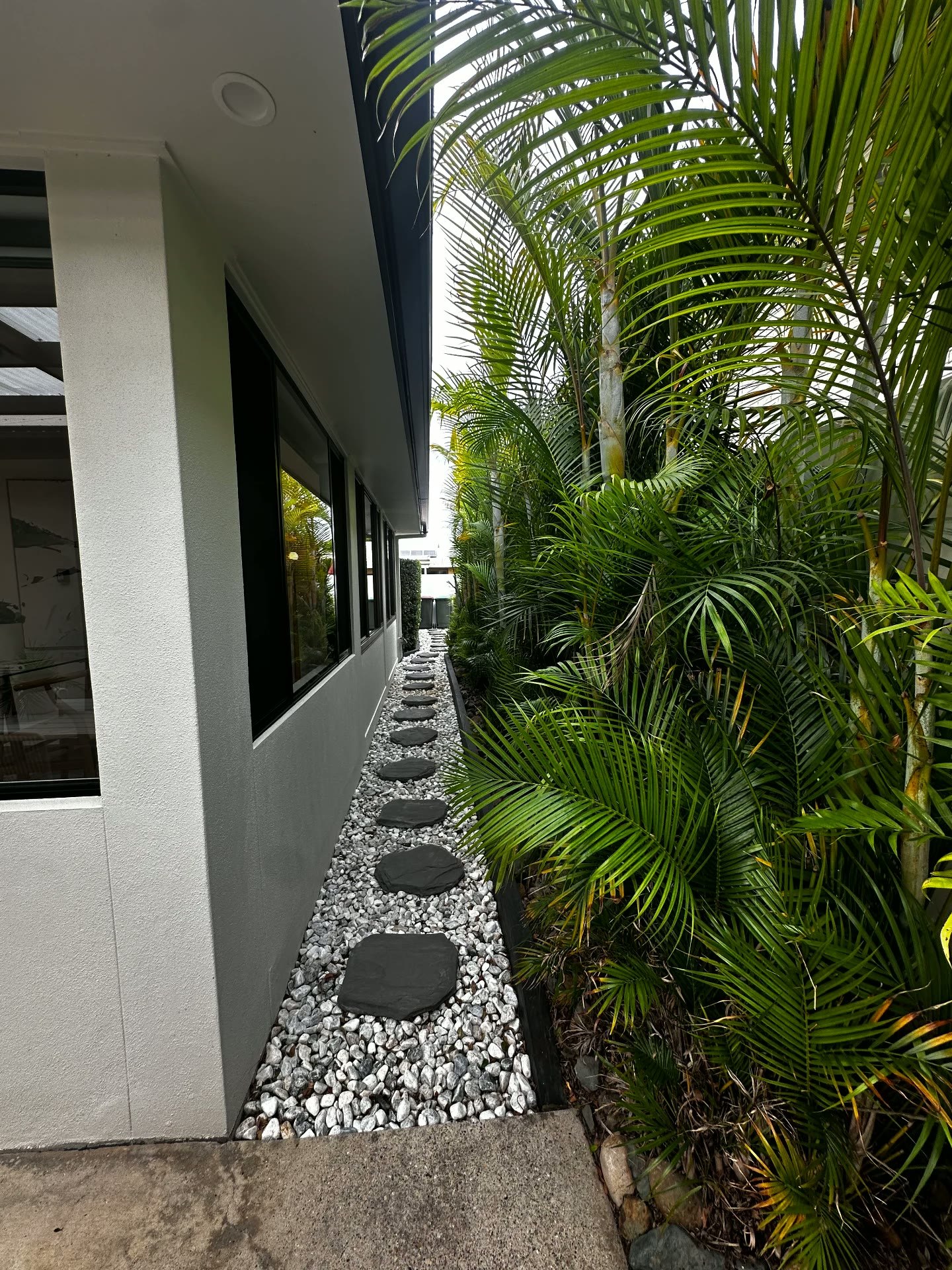 Existing soffit and under-roof space along the side of the home